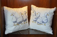pair of duck cushions coming and going on 100% cotton twill fabric